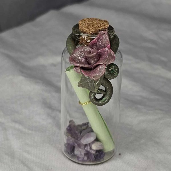 Handcrafted rose message in a bottle